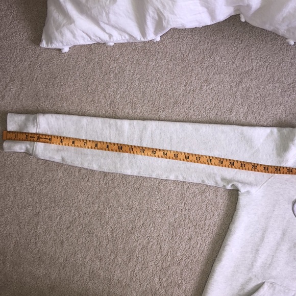 Very light grey TNA zip up with light purple logo - Picture 10 of 11